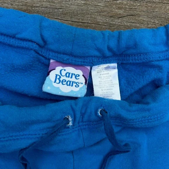 Y2K Blue Care Bear Capri Sweatpants w/ Grumpy Care Bear Graphic and Drawstring - Picture 4 of 7